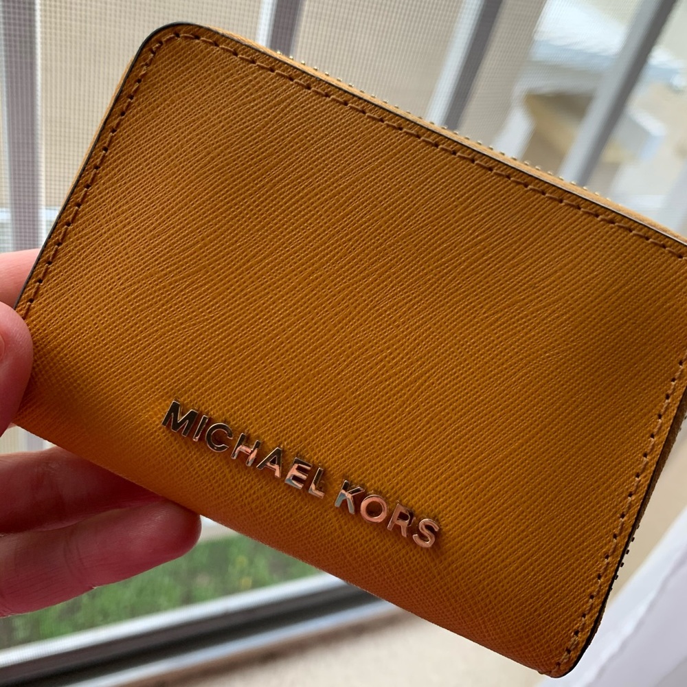 MICHAEL KORS mustard yellow zip around wallet